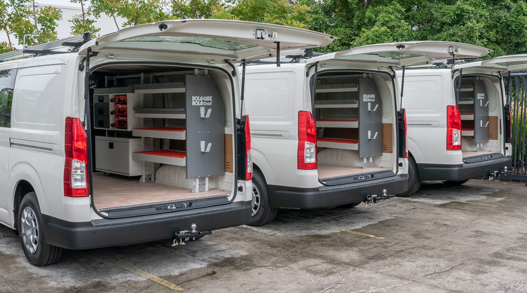 Rolacase shelving installed across a fleet of work vans