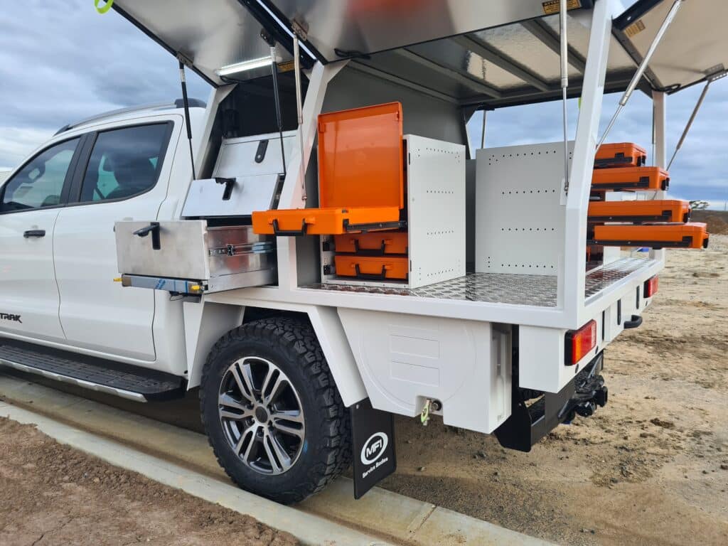 Canopy shelving system installed in ute service body