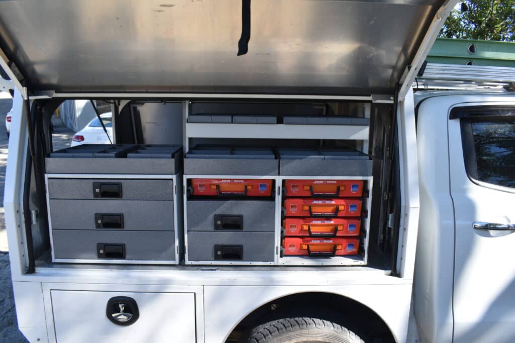 Organised canopy shelving with tools and parts stored neatly